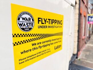One of the fly-tipping signs posted around Luton