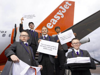 Jay, aged 12, Yusuf, aged 14, Mercedes, aged 14, Andrei, aged 14, and Jack, aged 12, from Lea Manor school in Luton, with uniforms donated by easyJet at London Luton Airport, as part of the airline’s new uniform donation initiative. Photo by: David Parry/PA Media Assignments
