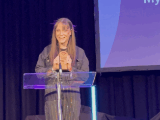 University of Bedfordshire student Danielle Foley collects an award